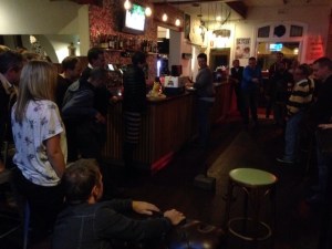 Tuesday trivia at The George. Yes, those are grown men engaging in a paper plane growing contest.